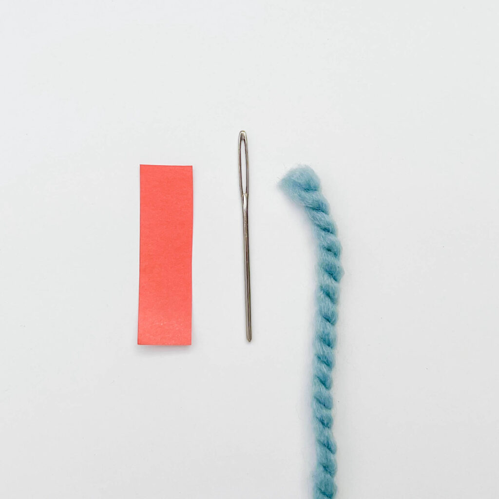 how to thread yarn through a needle - materials