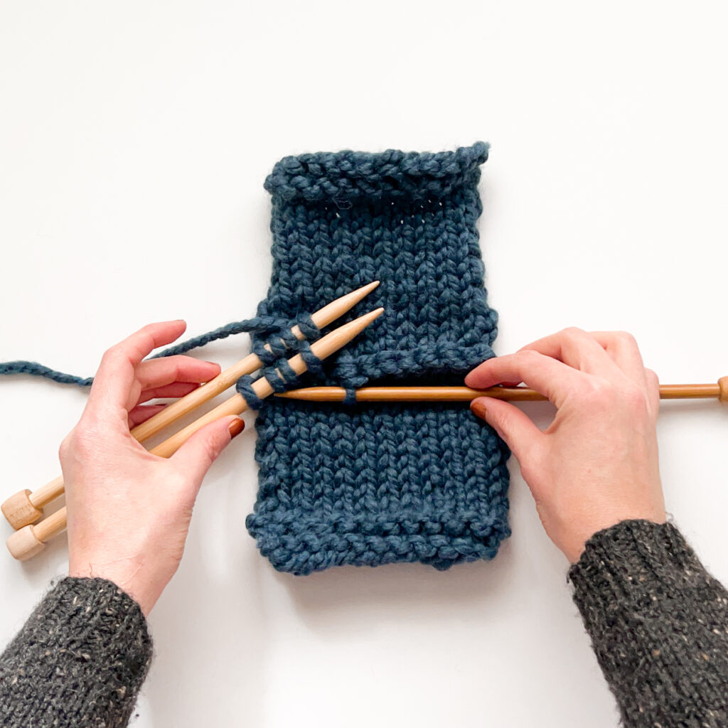 3 Needle Bind Off - an in progress knit-side seam