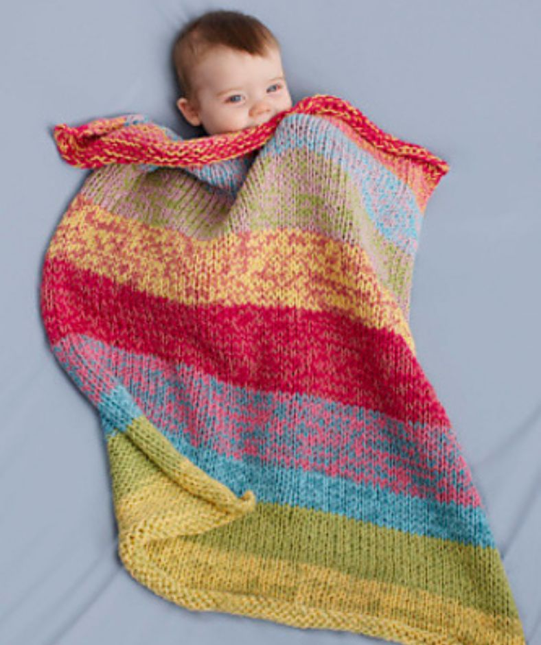 Baby Blanket Knit Patterns - baby gets ready for naptime under a Sunshine Day Baby Throw