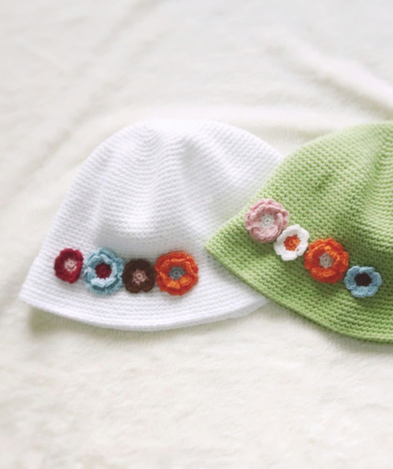 Crochet bucket hat pattern - pretty in spring bucket hat with crochet flowers