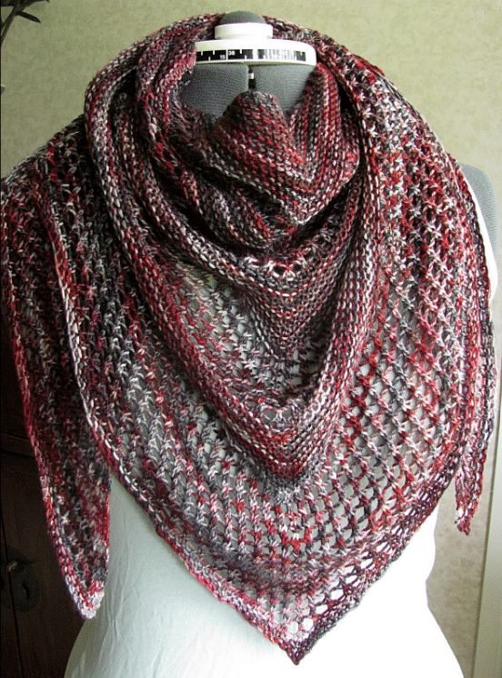 Colorful and lacy knitted shawl pattern.