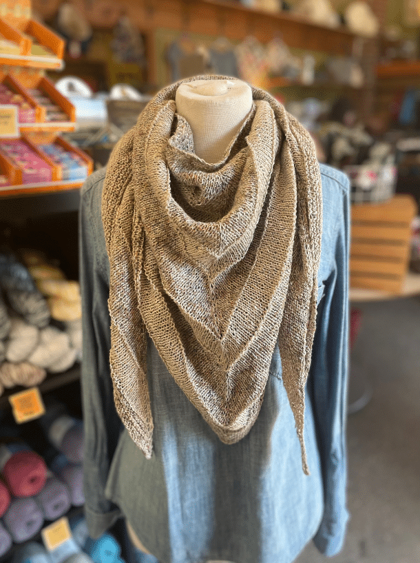 Simple and elegant knitted shawl pattern.