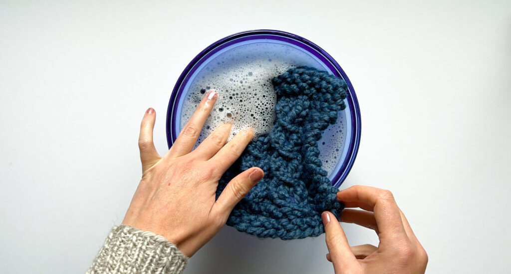 How to block knitting - submerging a knit swatch in a water bath