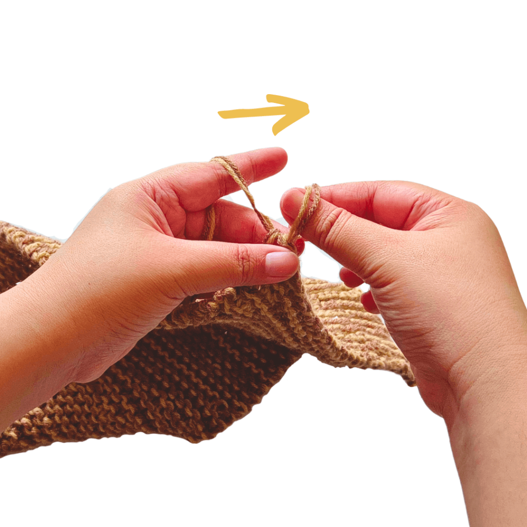 Take the last loop and pull the yarn through. 