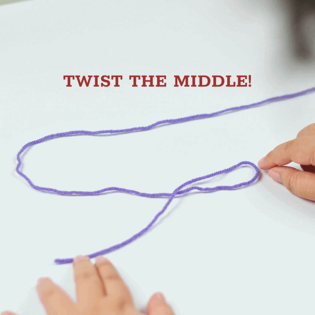 Step 1: Make an "S" shape

Make an "S" shape with your yarn and twist the middle to form a loop.