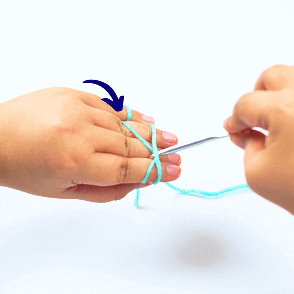 Step 3: Grab a loop

Take your crochet hook and grab the second loop from underneath.