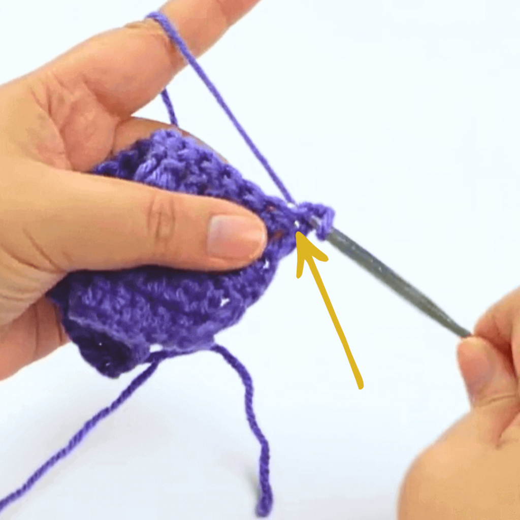 Step 1: Go into the first stitch

Go into the first stitch and pick up a loop. Don't yarn over!