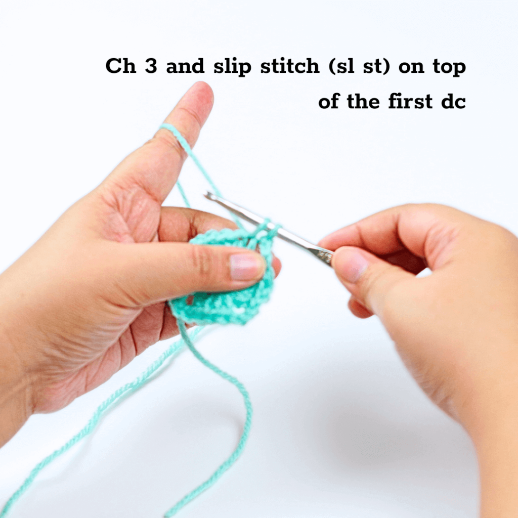 slip stitching on top of the first double crochet