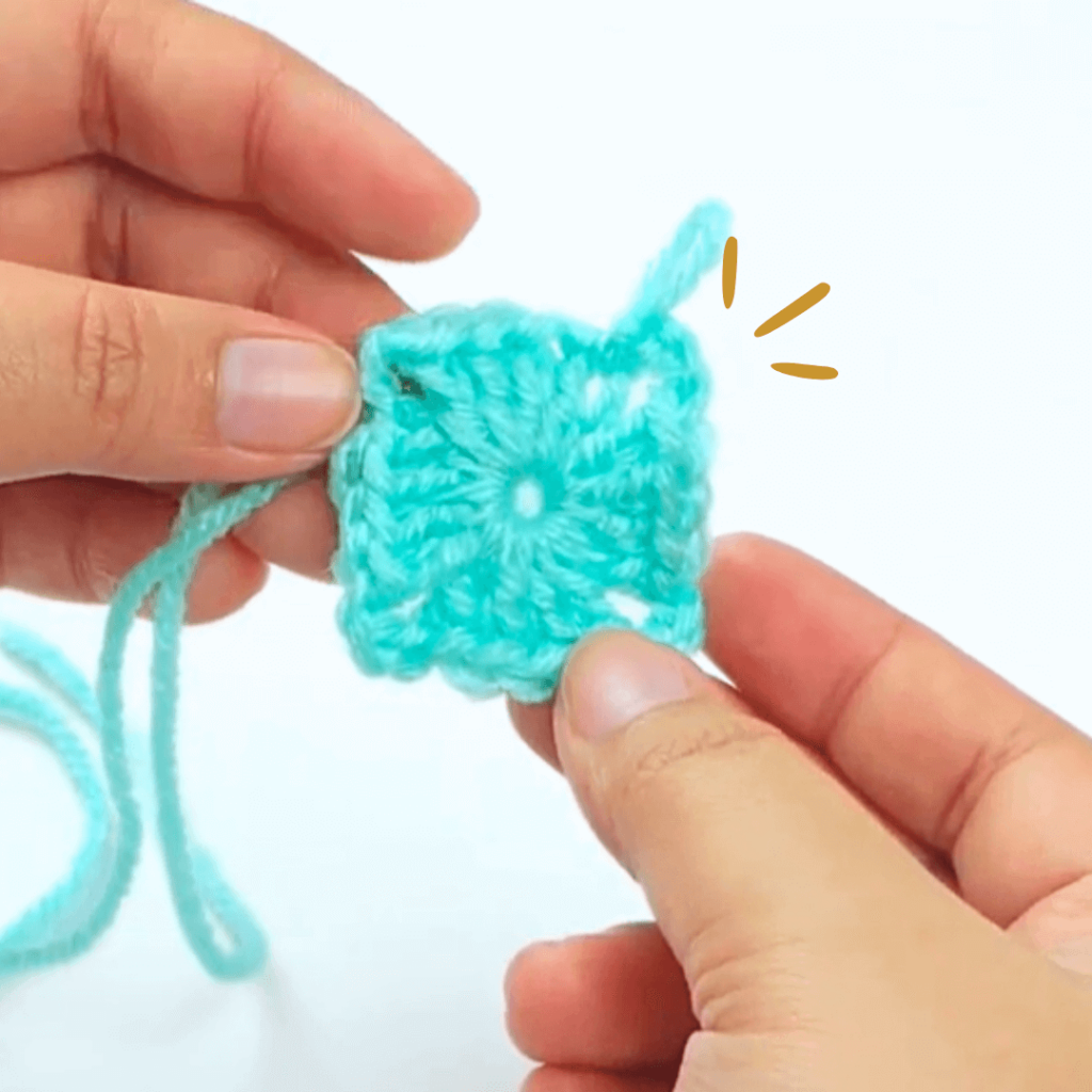 A tiny crochet granny square