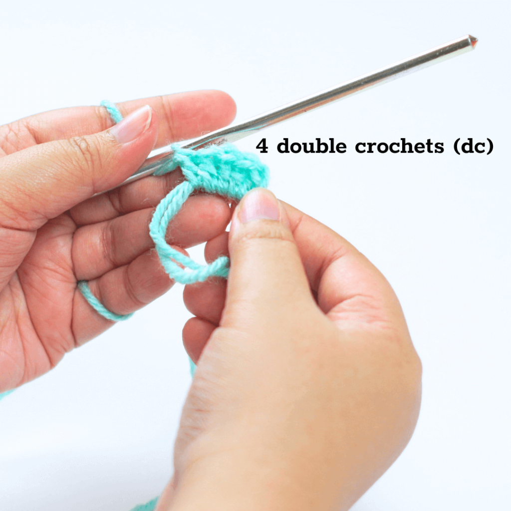 Step 1: 

Make 4 double crochets (dc) inside the magic ring.