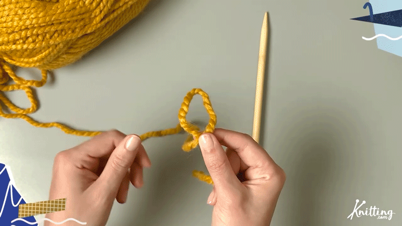 STEP 3

Pinch the middle of the loop with your thumb to hold it in place.