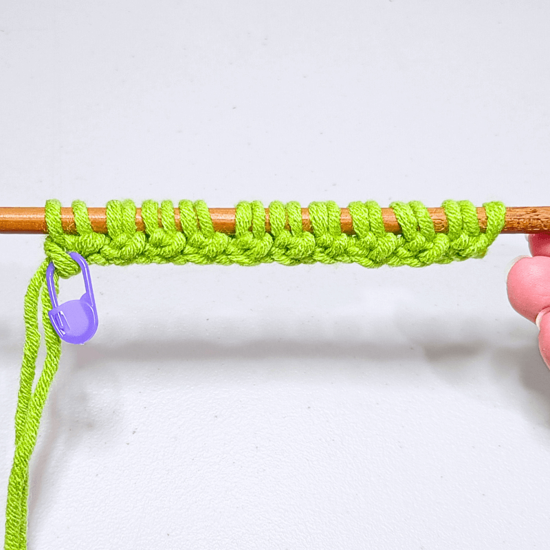 Place your stitch marker at the end (PM)