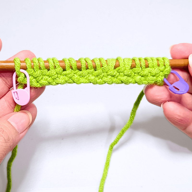 Place your stitch marker at the end (PM)