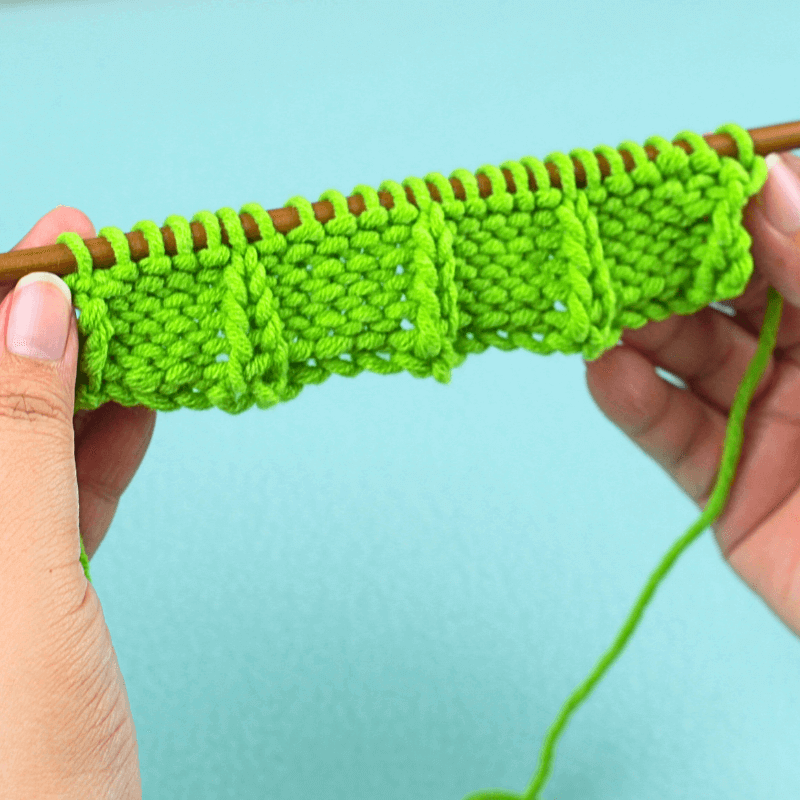 We're only alternating between rows 1 and 2 until we have 6 rows in total for the first batch.

Row 1: *K1, P5*. Keep repeating this pattern until the end of the row. Pm (place your stitch marker.

Row 2: *K5, P1*. Repeat this pattern until the end of the row. Pm.

Row 3: *K1, P5*. Pm.

Row 4: *K5, P1*. Pm.

Row 5: *K1, P5*. Pm.

Row 6: *K5, P1*. Pm.
