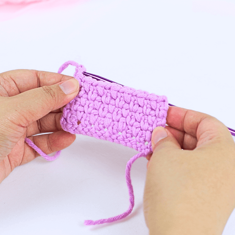 Row 3

Row 3 is basically just a repeat of row 2.

Ch 2, turn. *sc in the ch 1 sp, ch 1, sk the sc in the previous row, sc in the next ch 1 space* until the end of the row.

Just repeat Rows  2 and 3 until your project reaches the length you need!